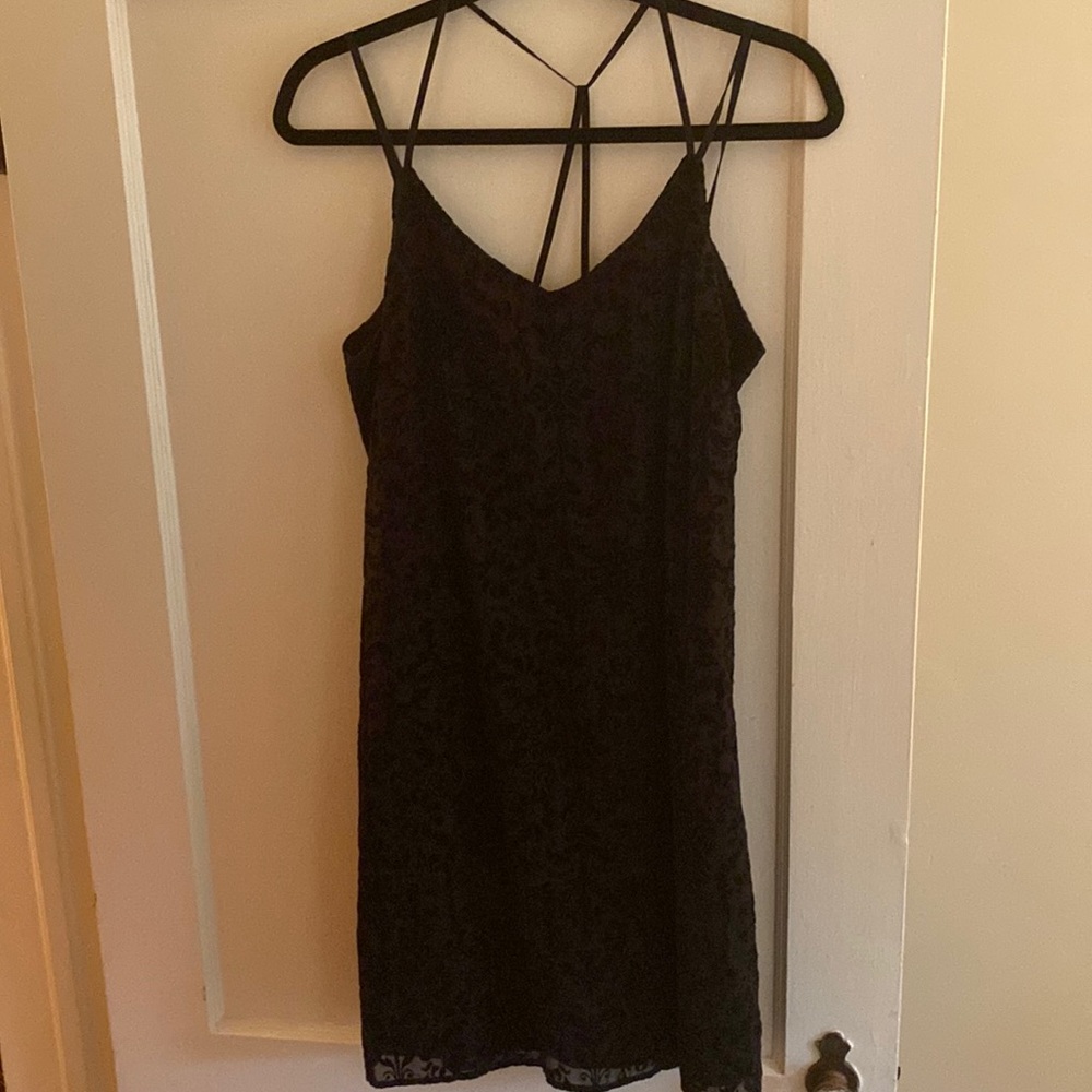 Strappy-back black velvet cocktail dress